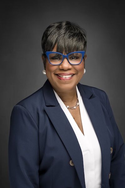 Headshot of D Malone.